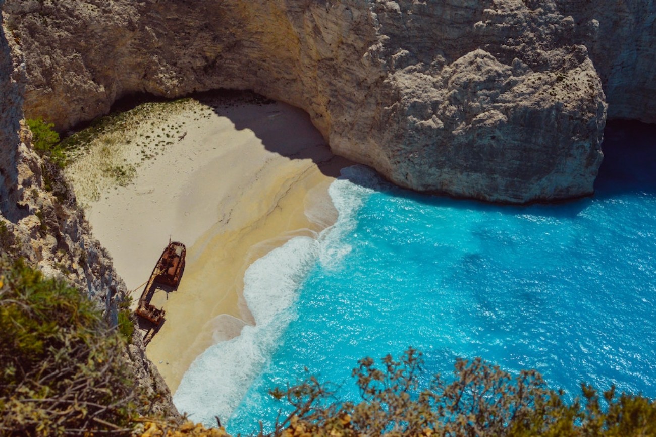 Shipwreck Beach, Zakynthos, Greece. Photo by Loyd Dricks via Unsplash